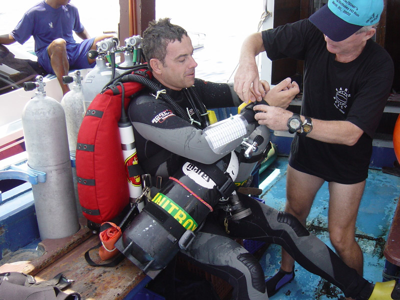 Glen helping me to get ready for 260m dive